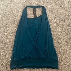 Studio y teal halter top with chain detail in back.